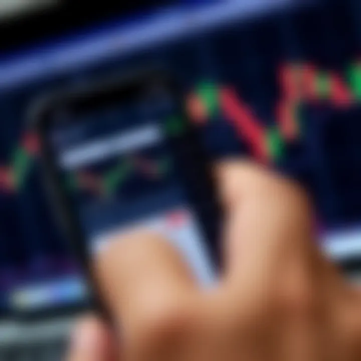 Mobile phone displaying a forex trading platform with charts and currency pairs